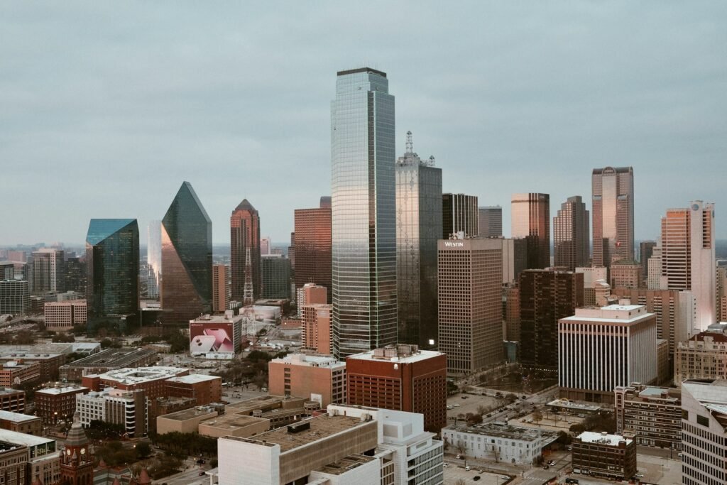 Stunning view of Dallas skyline at sunset, showcasing the vibrant business district and modern architecture, ideal for professional branding photography context.