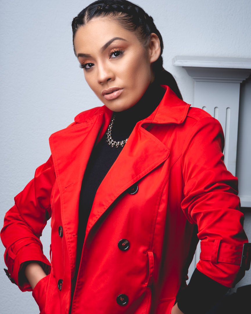 Artistic Emages luxury branding portrait of confident woman in red trench coat