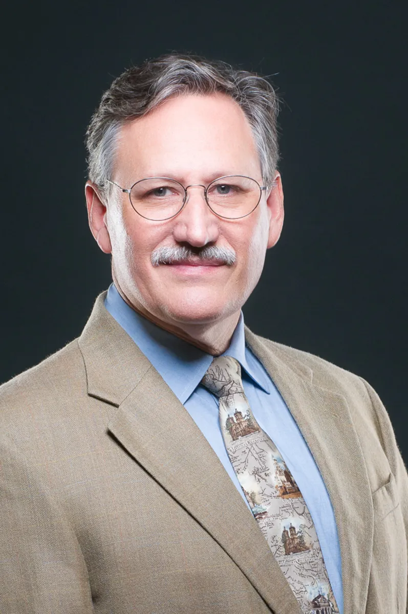 Executive branding photography example showing a composed executive with a calm, authority-focused presence