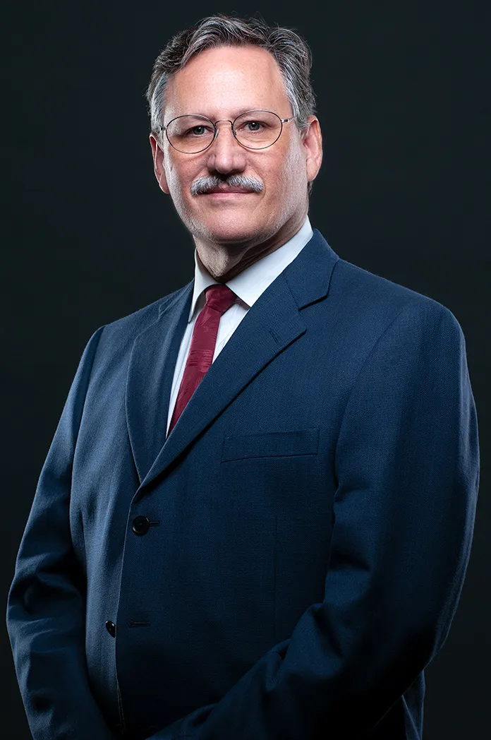 Executive branding photography of a Dallas–Fort Worth business leader presenting calm authority and trust