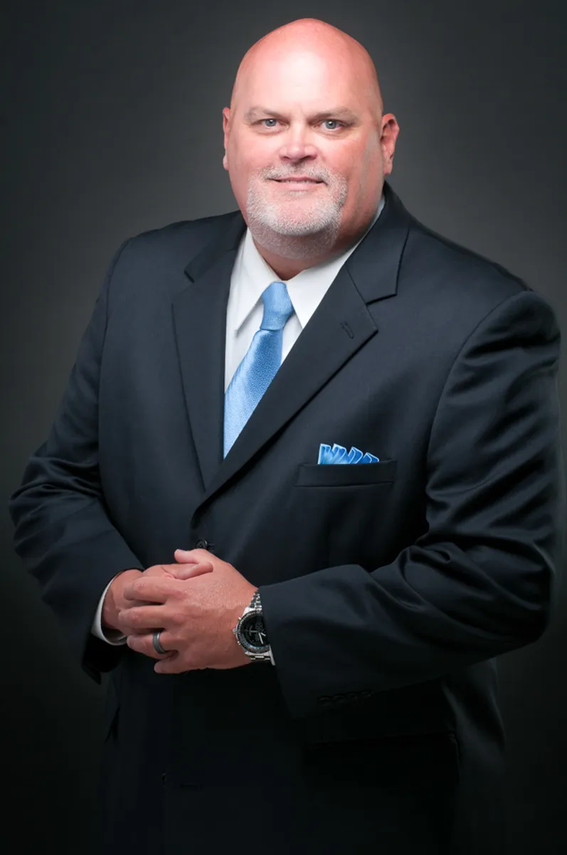 Executive branding photography for a Dallas–Fort Worth business leader conveying authority and credibility