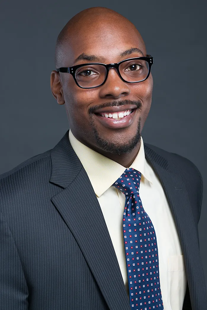 male executive headshot Dallas professional business portrait wearing glasses